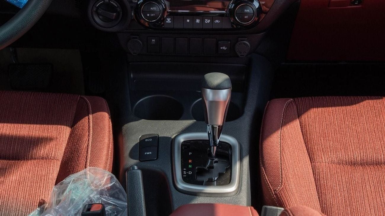 تويوتا هيلوكس Toyota Hilux pickup double cabin Petro engine 2.7L 4x4 white with red interior fully automatic