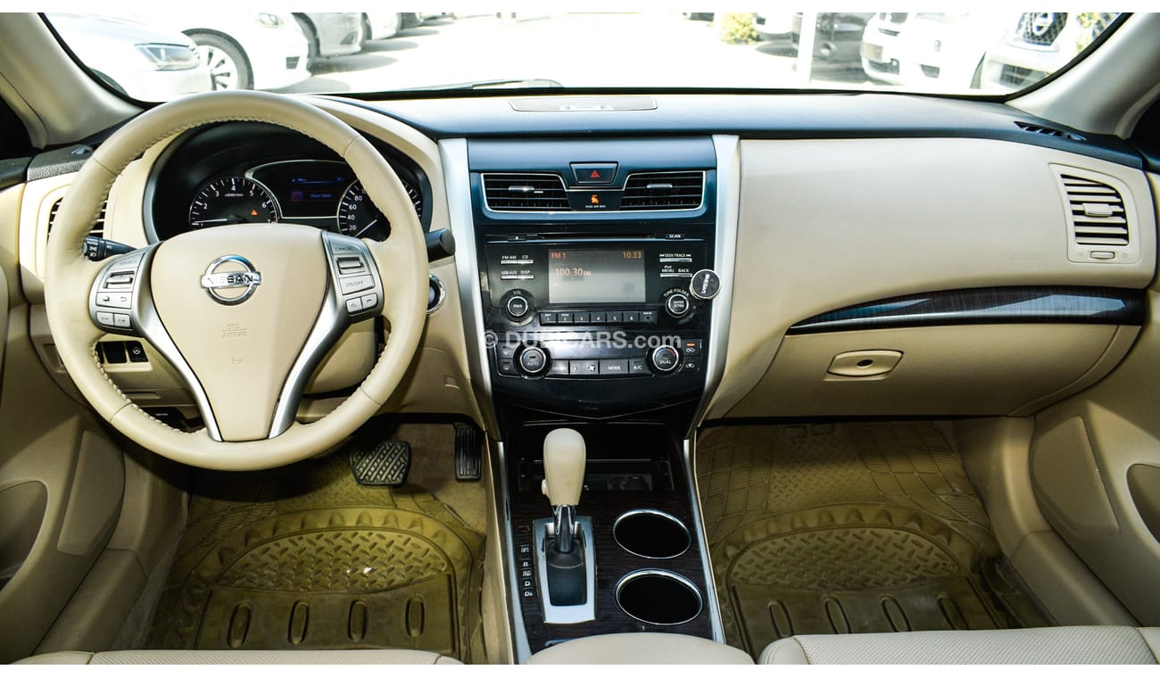 Nissan Altima White color inside Big Ward No.1 fingerprint slot, leather alloy wheels, camera screen control senso