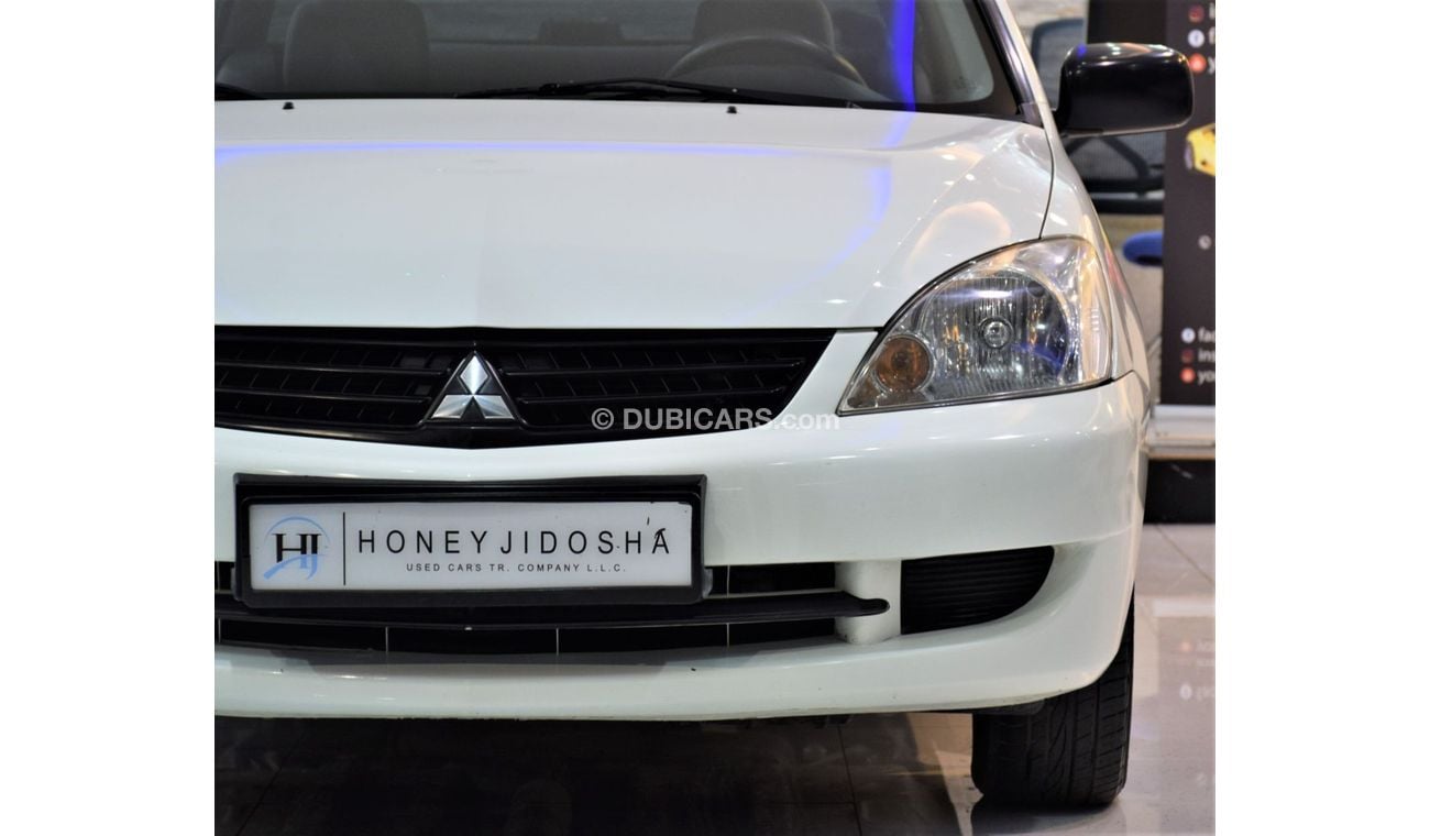 Mitsubishi Lancer EXCELLENT DEAL for our Mitsubishi Lancer 2012 Model!! in White Color! GCC Specs