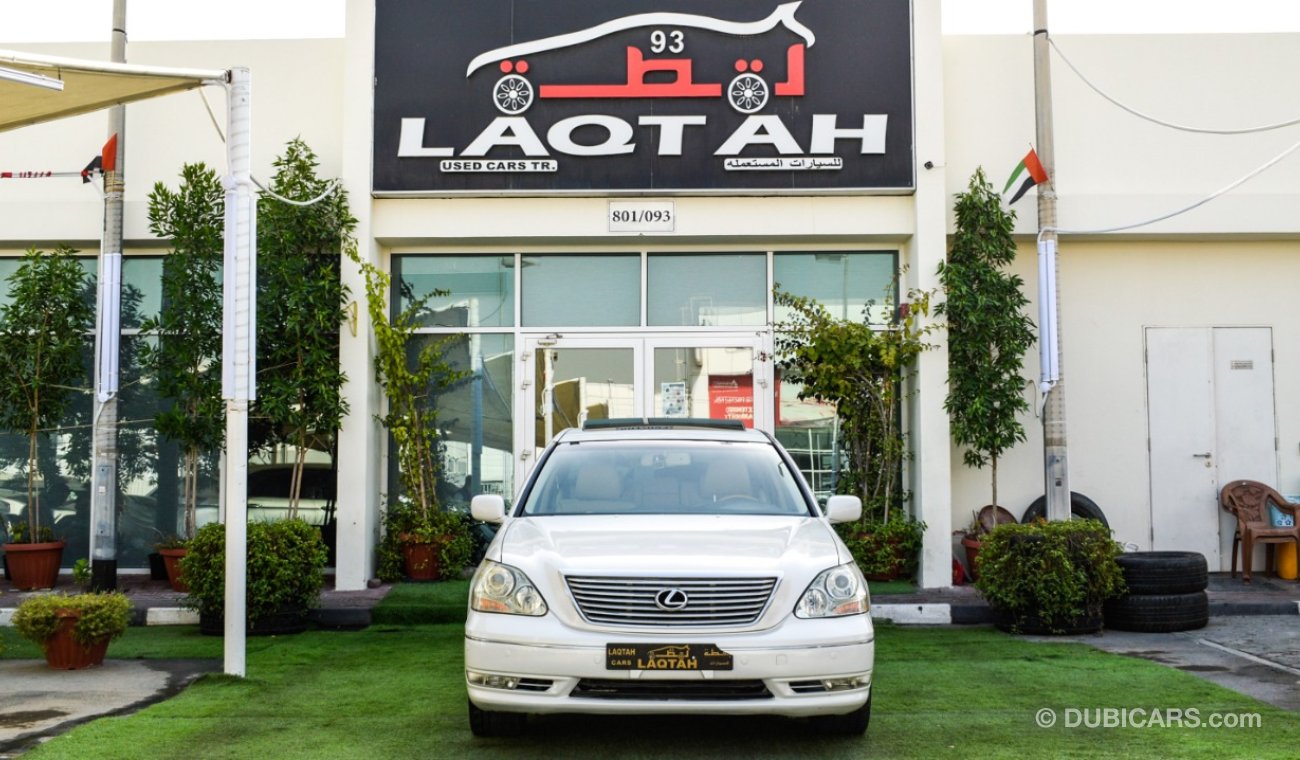 Lexus LS 430 Imported 1/2 Ultra, model 2006, white color, leather opening, wooden wheels, electric mirrors, excel