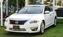 Nissan Altima White color inside Big Ward No.1 fingerprint slot, leather alloy wheels, camera screen control senso