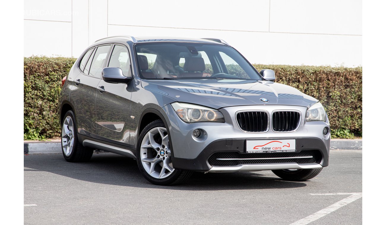 BMW X1 2012 - GCC - FULL OPTION - ASSIST AND FACILITY IN DOWN PAYMENT - 3235 AED/MONTHLY