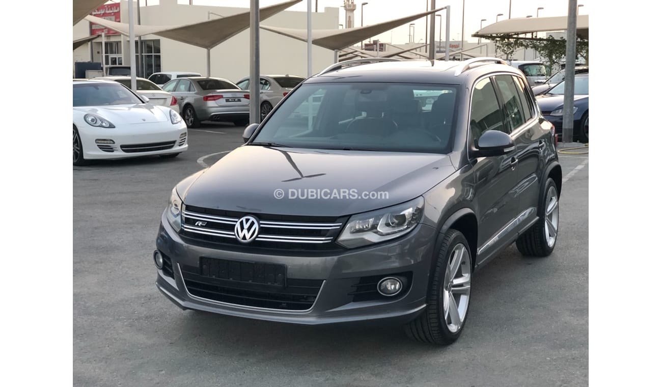 فولكس واجن تيجوان موديل 2014 خليجي فل مواصفات كراسي جلد ومثبت سرعه وتحكم كهربي كامل ونظام صوت ممتاز وكاميرا خلفيه