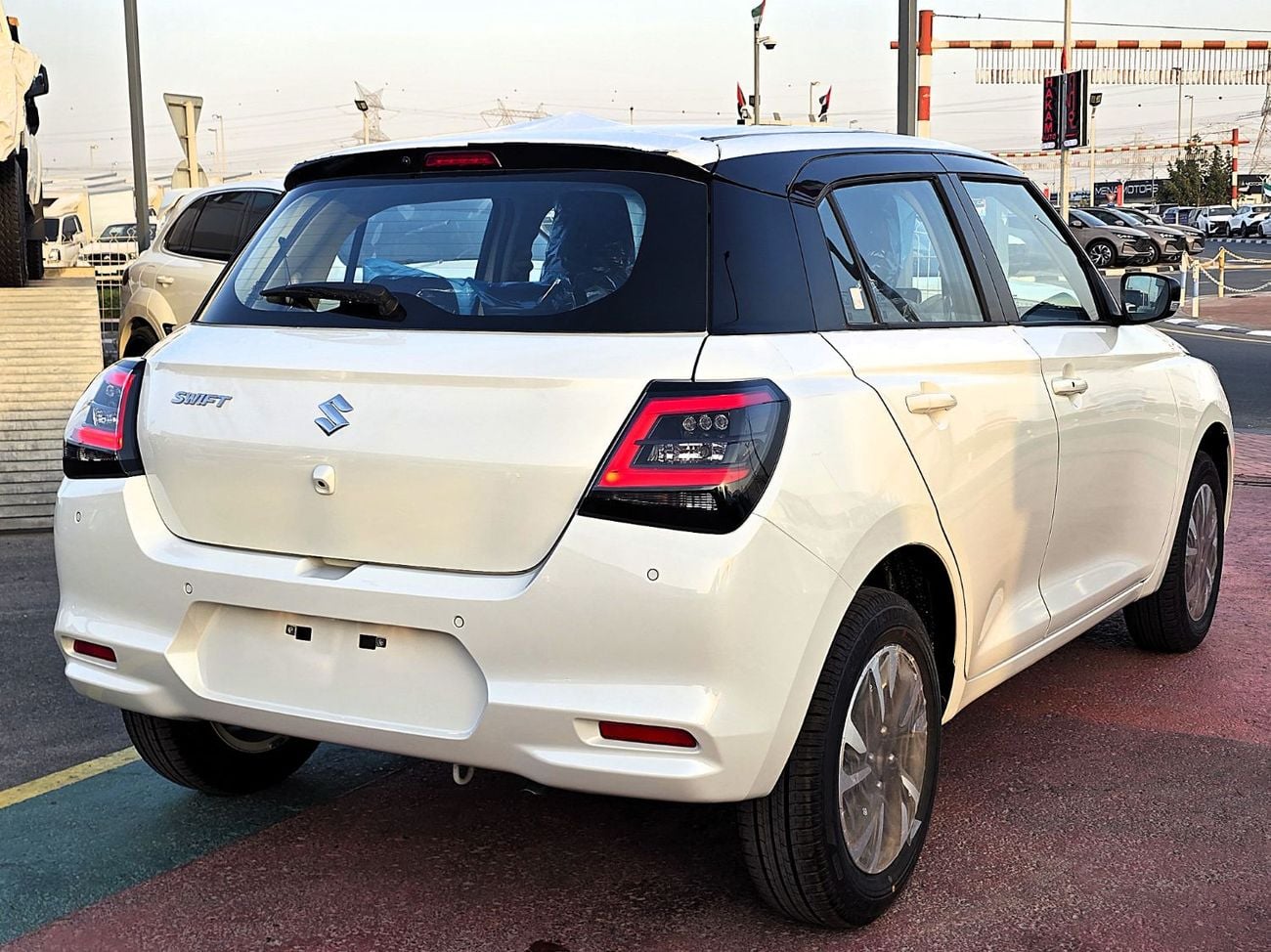 Suzuki Swift Suzuki Swift GLX 1.2L Two Tone White color with black roof  2026 model
