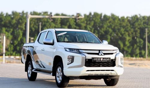Mitsubishi L200 GLX 2.4L Mitsubishi L200 2.4 L 2021 GCC accident free in excellent condition 1303 P.M