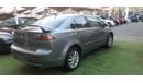 Mitsubishi Lancer Gulf gray color inside beige without accidents Rings rear wing sensors fog lights in excellent condi