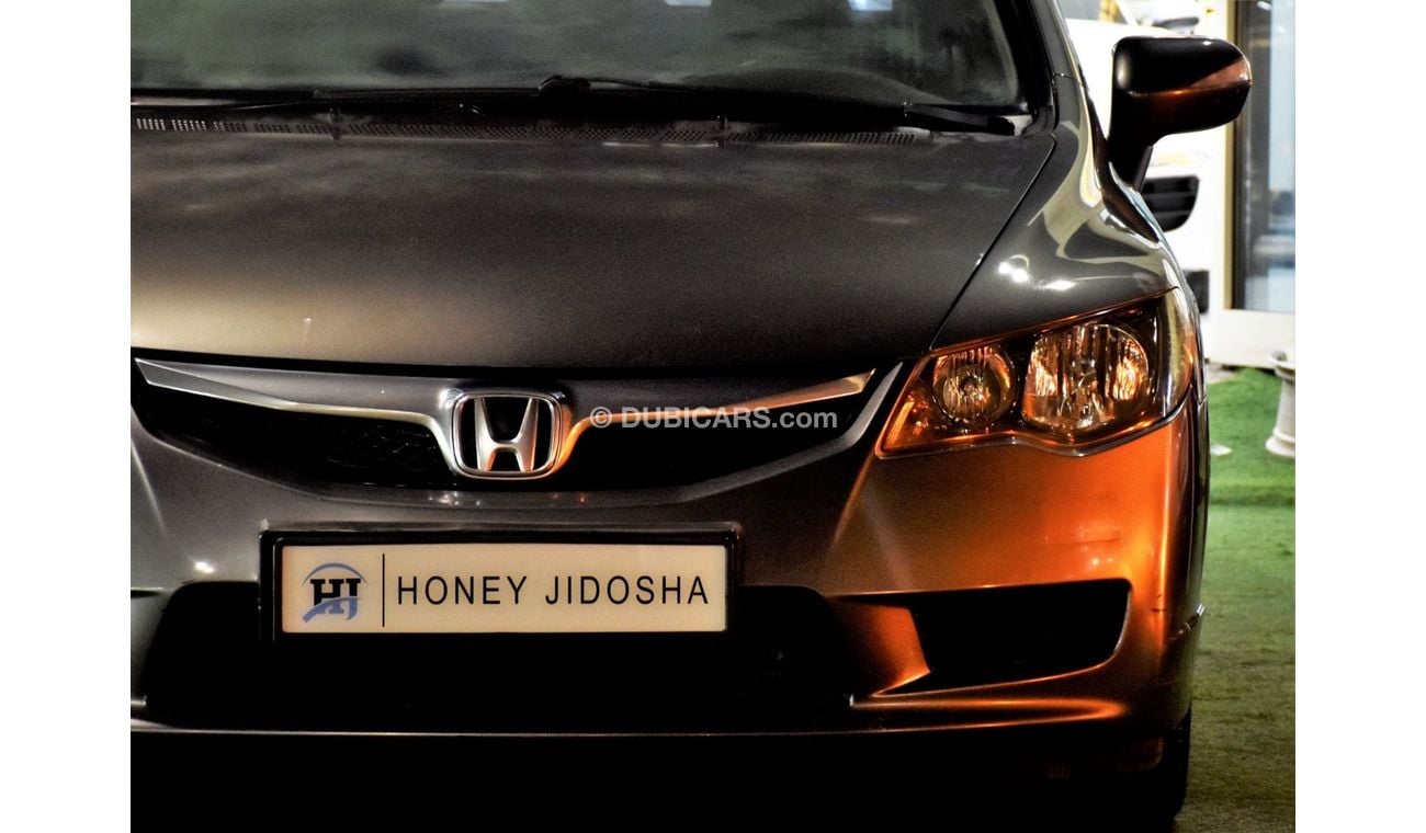 Honda Civic EXCELLENT DEAL for our Honda Civic 1.8 i-VTEC ( 2009 Model ) in Grey Color GCC Specs