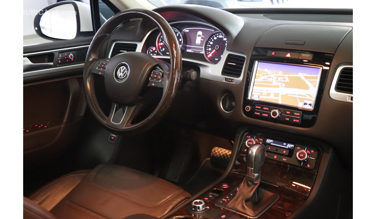 Volkswagen Touareg Sport 2013 GCC under 2 years Warranty with Zero downpayment.