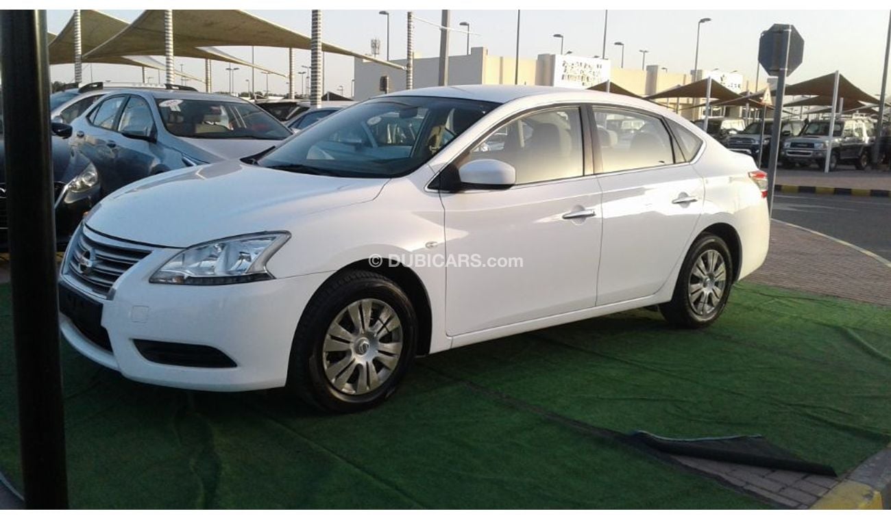 Nissan Sentra 2015 white 1.8 Gcc Excellent Condition without Accidents