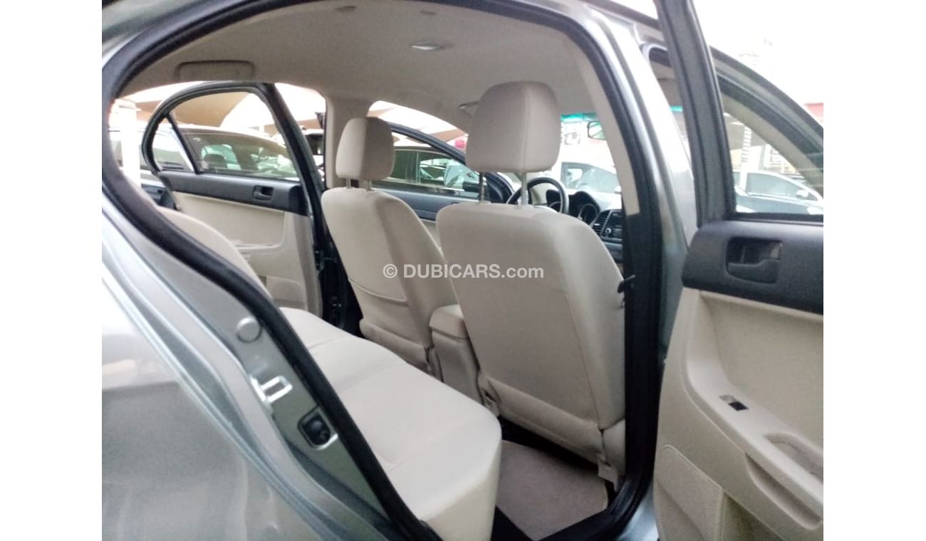 Mitsubishi Lancer Gulf gray color, inside beige without accidents, rear wing sensors, fog lights, in excellent conditi