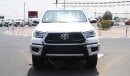 Toyota Hilux 2.4L diesel  . White 2023 model, M/T Wide body with Chrome bumper