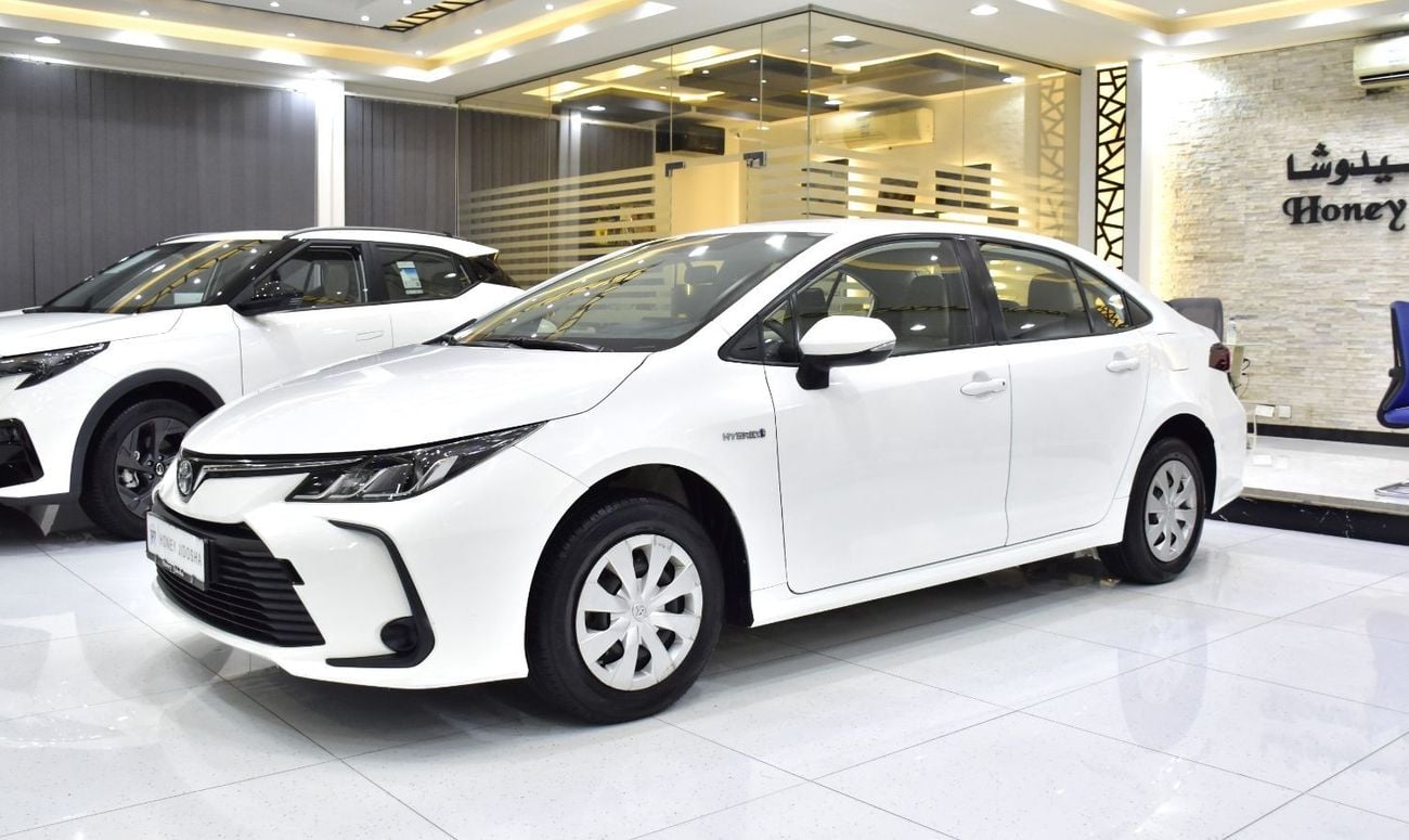 Toyota Corolla EXCELLENT DEAL for our Toyota Corolla Hybrid ( 2021 Model ) in White Color GCC Specs
