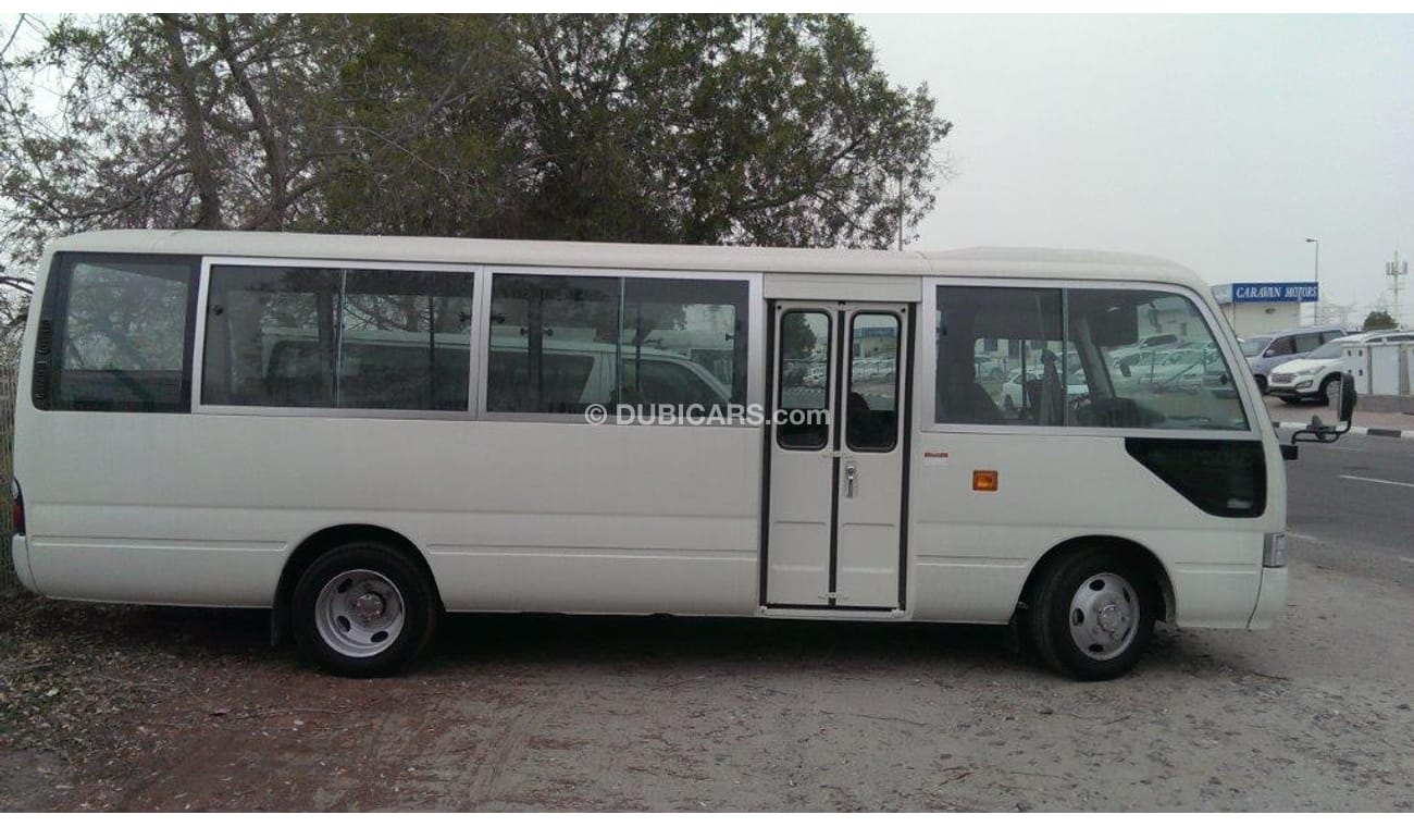 Toyota Coaster Bus DSL 30 seater Standard Roof