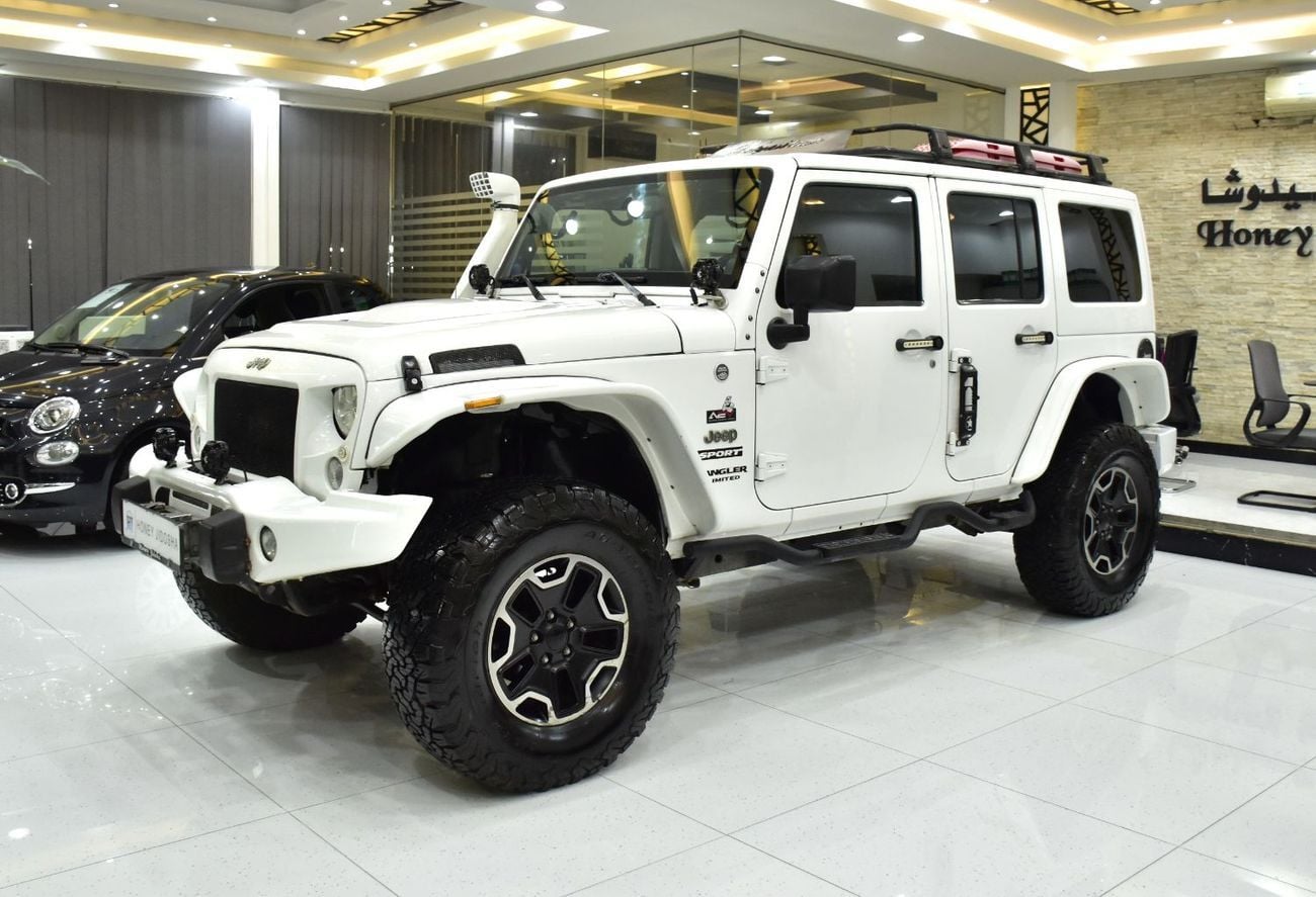 Jeep Wrangler Unlimited EXCELLENT DEAL for our Jeep Wrangler Unlimited Sport ( 2014 Model ) in White Color GCC Specs