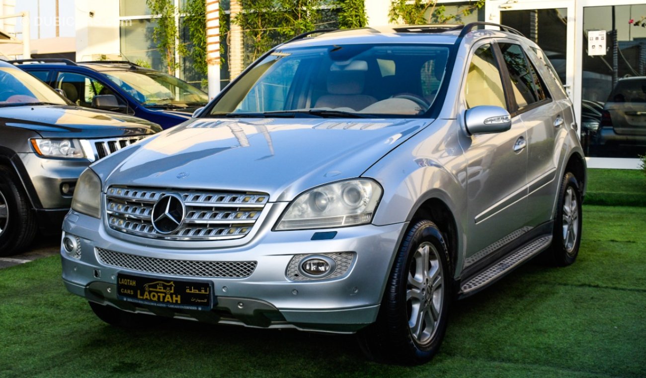 Mercedes-Benz ML 350 خليجى - رقم  واحد - فتحة  - جلد - حساسات - رنجات - خشب - جناح خلفى بحالة ممتازة لاتحتاج لمصاريف