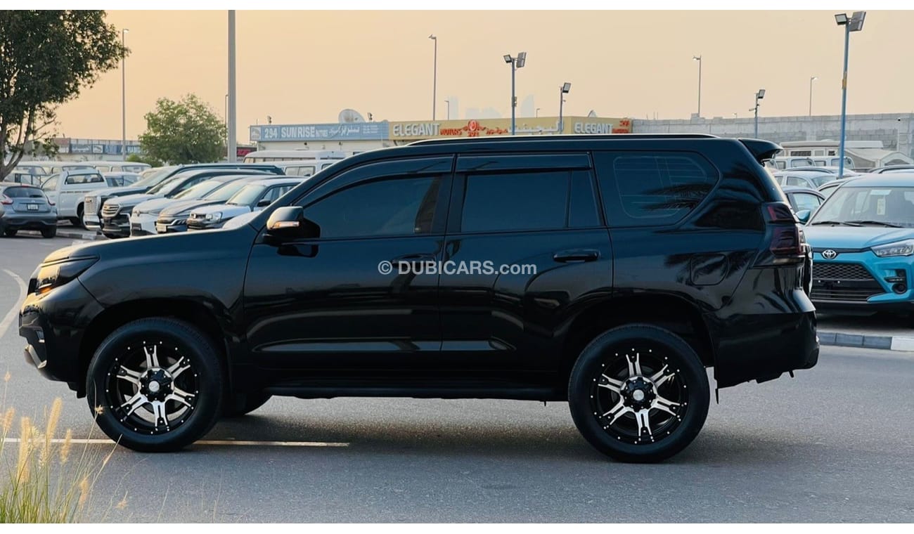 تويوتا برادو 2011 Fully Modified 'Black Beauty' 2.7L Petrol 4WD AT Push Start Leather Electric 7 Seats Tesla Scre