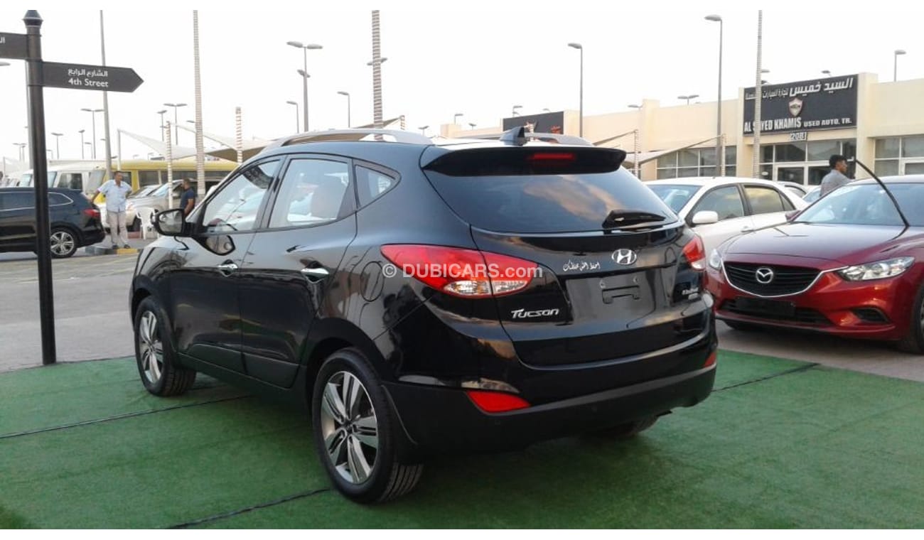 Hyundai Tucson HYUNDAI TUCSON 2015 BLACK NO PIANT NO ACCIDENT KHALIGE FULL OPTION NUMBER 1