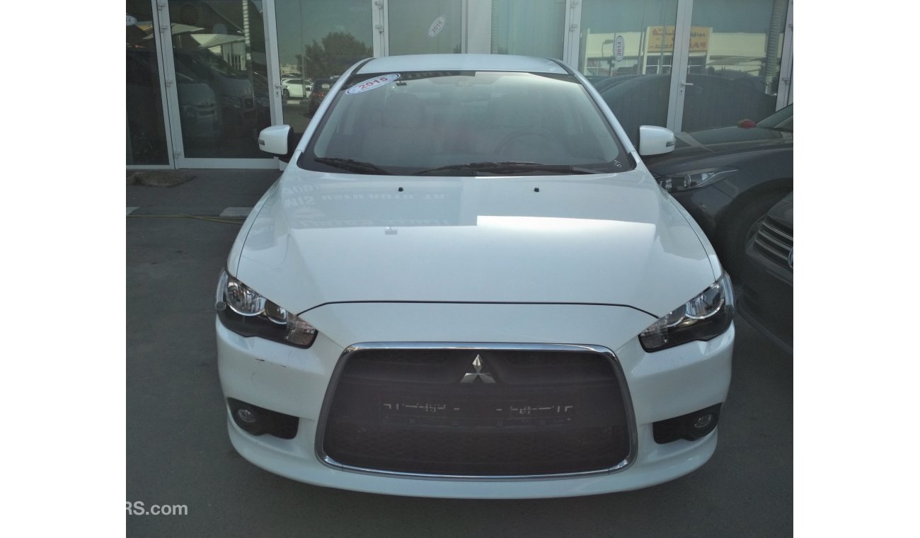 Mitsubishi Lancer 2015 WHITE GCC NO PAIN NO ACCIDENT PERFECT