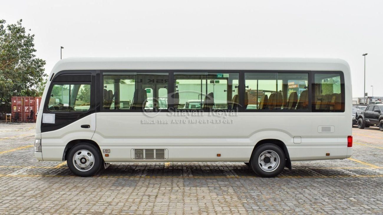 Toyota Coaster DLX 4.2L DIESEL 23 SEATER MT 2026MY
