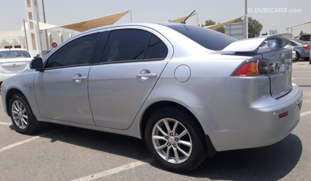 Mitsubishi Lancer السيارة نظيفه جدا بحاله ممتازه بدون حوادس ضمان شاسيه جير ماكينه