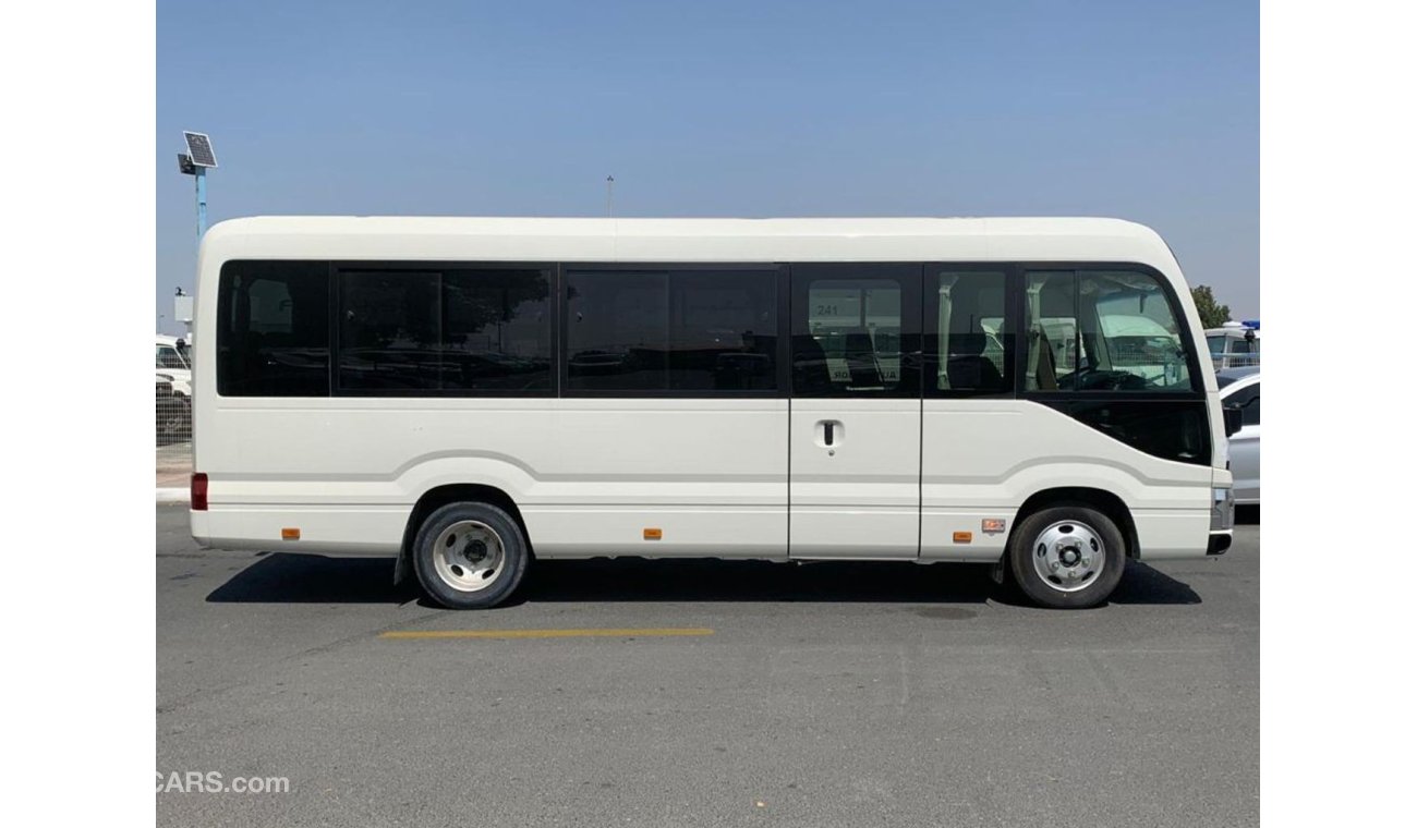 Toyota Coaster 4.2L Diesel 22 seater Full Option Automatic door