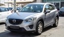 Mazda CX-5 Pre-owned Mazda CX-5 AWD for sale in Sharjah. Grey/Silver 2014 model, available at Wael Al Azzazi Sh