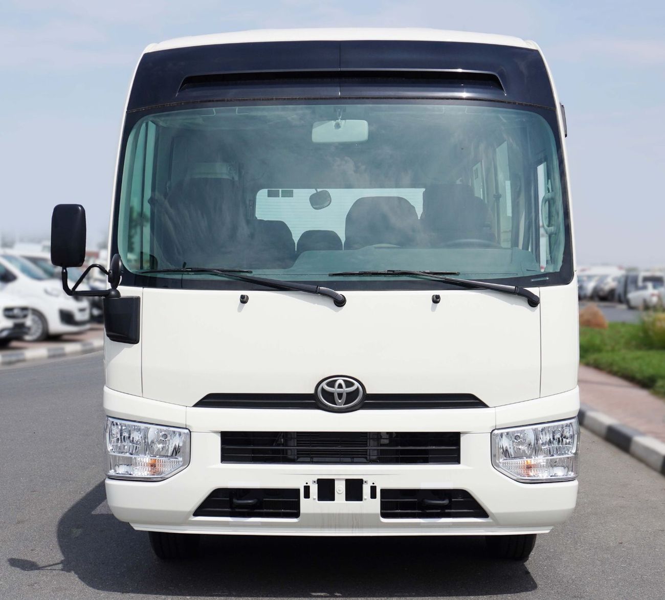 Toyota Coaster 2025 MODEL TOYOTA-COASTER 2.8L TD A/T (22 STR, WITH REFRIGERATOR AND HIGH BACK SEATS)