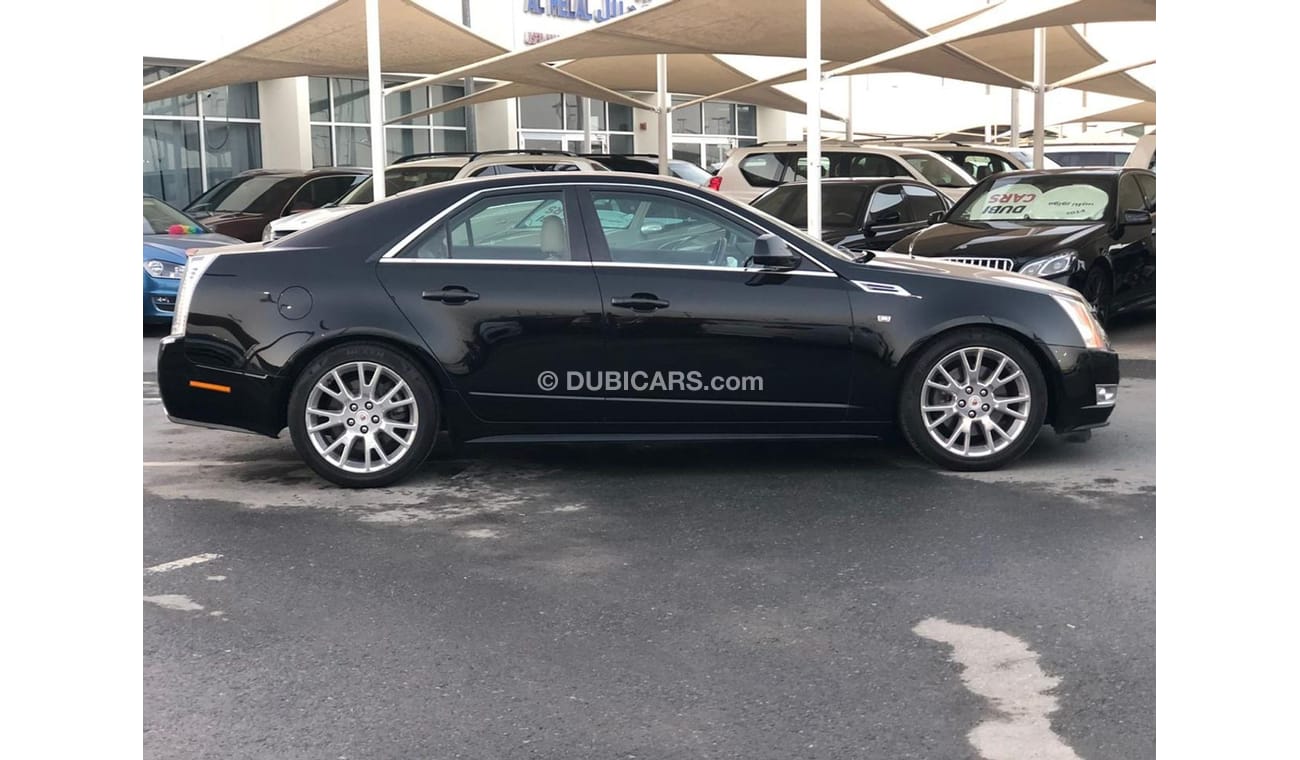 كاديلاك CTS موديل 2010 خليجي حاله ممتازه من الداخل والخارج فل مواصفات كراسي جلد وتبريد وتسخين في الكراسي ومثبت س