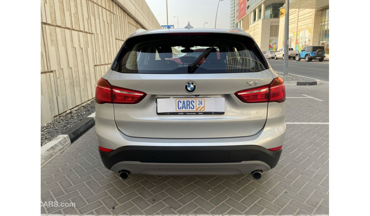 BMW X1 2L | S drive 20|  GCC | EXCELLENT CONDITION | FREE 2 YEAR WARRANTY | FREE REGISTRATION | 1 YEAR FREE