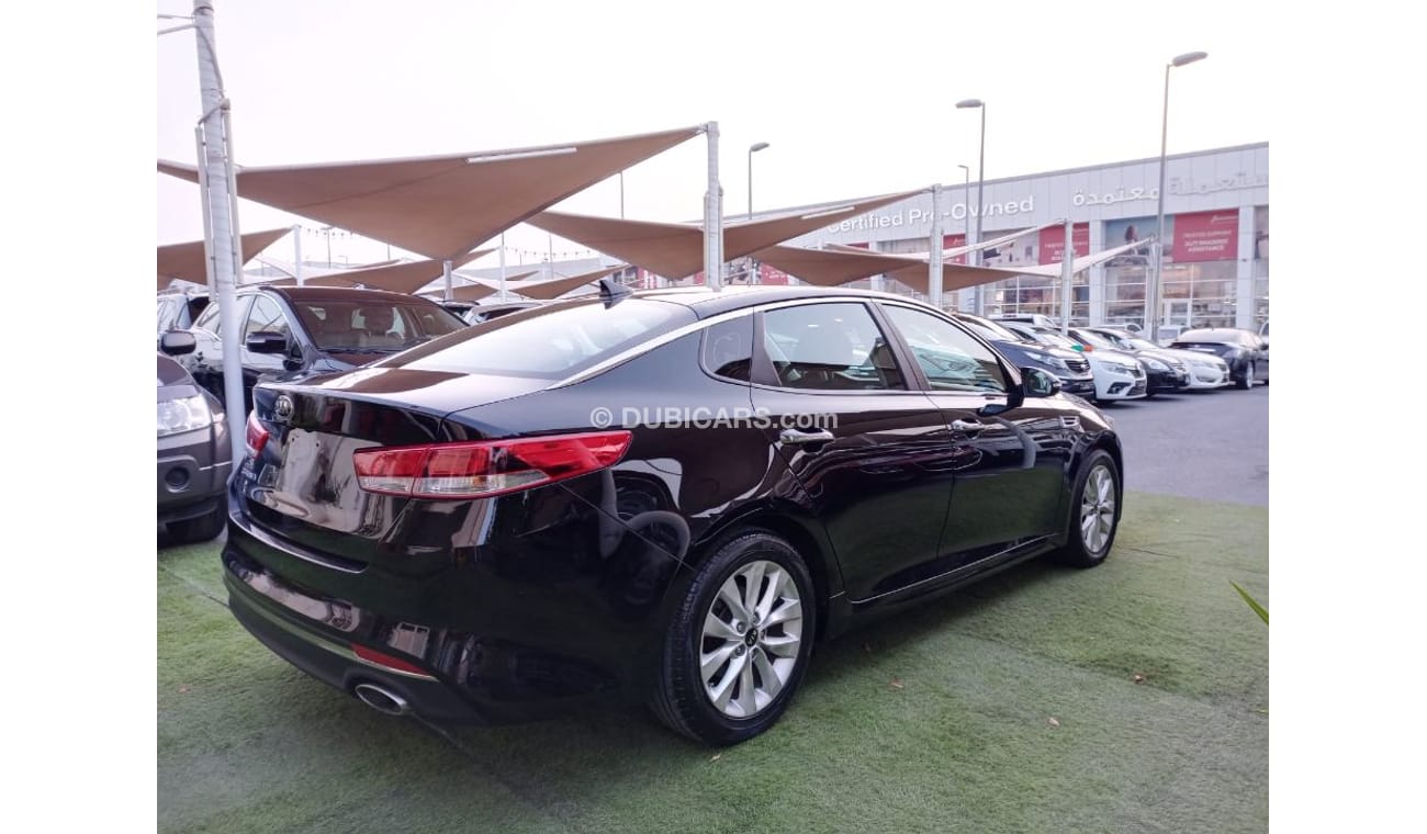 كيا أوبتيما وارد2016 رقم 2 رنجات  حساسات رنجات ومثبت سرعه وكاميرا خلفيه لاتحتاج الي مصاريف بحالة ممتازة