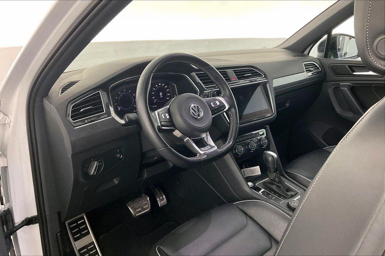 فولكس واجن تيجوان R-Line | شامل الضمان | 0 ﺪﻔﻋﺓ ﺃﻮﻟﻯ