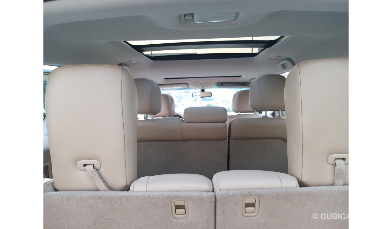 Nissan Pathfinder Gulf model 2014 leather panorama cruise control screen camera electric chair in excellent condition