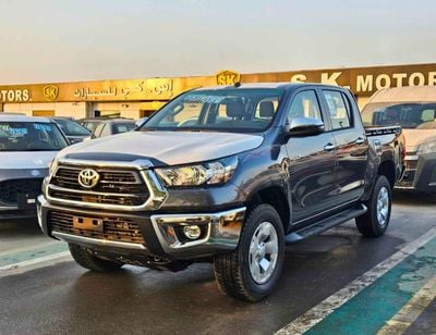تويوتا هيلوكس WIDE BODY | M/T |  2.4L V4 DIESEL | 3 AIRBAG | COOL BOX | LARGE DVD |  UNDER PROTECTOR STRIPE TAPE B