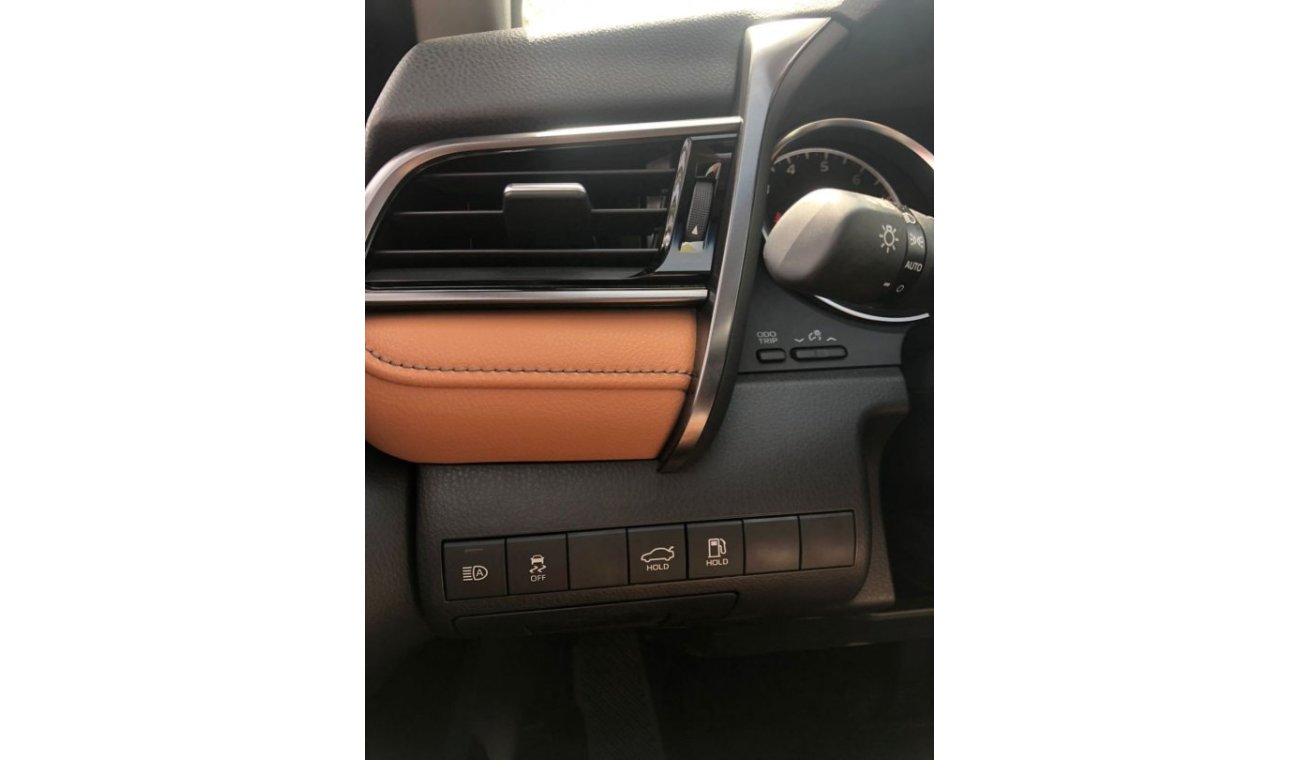 Toyota Camry TOYOTA_CAMERY_GRANDE_2023_3.5L_avaialable_white_black_hybrid