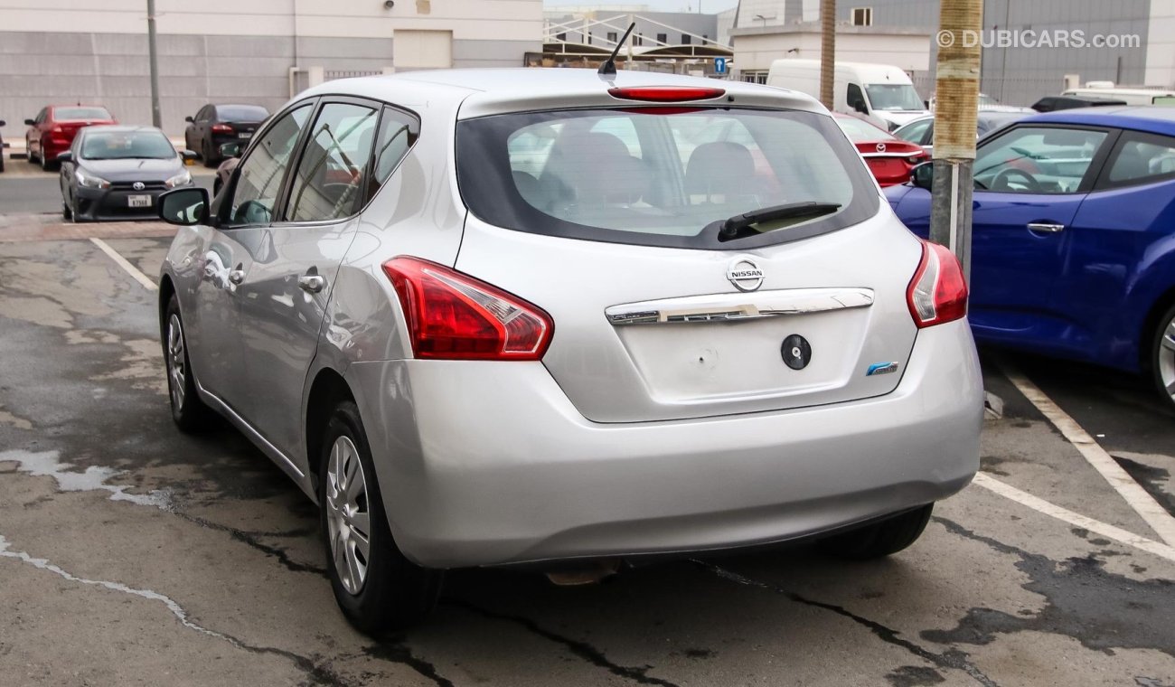 Nissan Tiida Pre-owned  for sale in Sharjah. Grey/Silver 2016 model, available at Wael Al Azzazi Shar