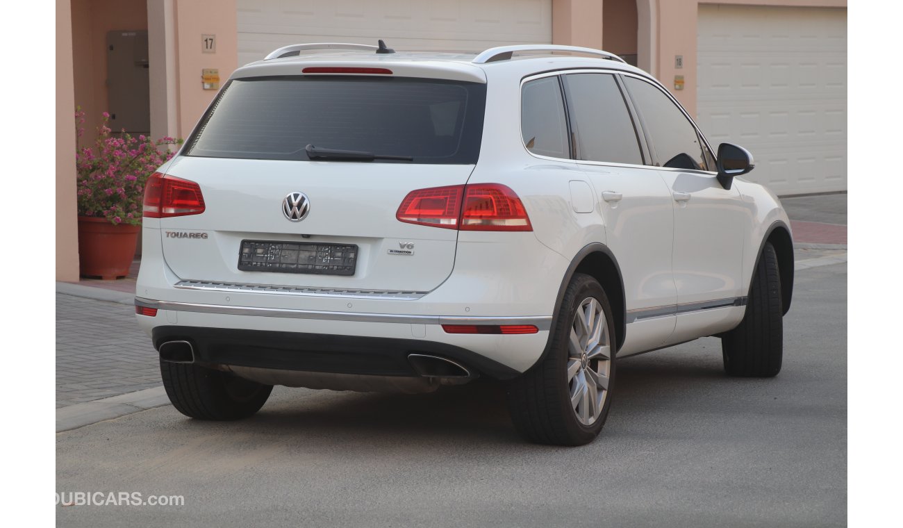 Volkswagen Touareg Sport 2015 GCC with Zero Down-Payment.