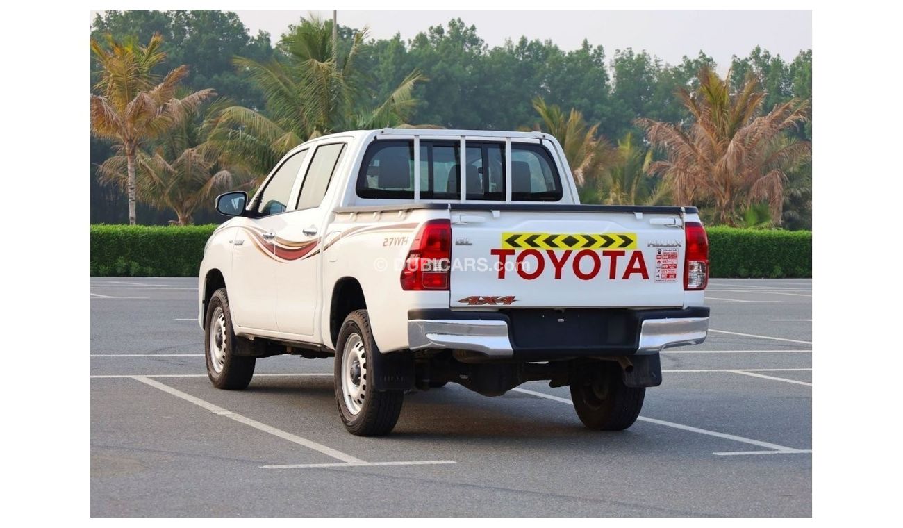 تويوتا هيلوكس GL 2019 2.7L 4X4 DOUBLE CAB A/T PETROL | GCC SPECS - LIKE NEW CONDITION READY TO DRIVE