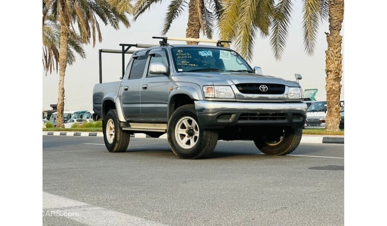 Toyota Hilux 2002 | PETROL AT 2.7L V4 [ROOF RACK] (KEY START) SIDE STEPS | VERY CLEAN VEHICLE | GOOD CONDITION