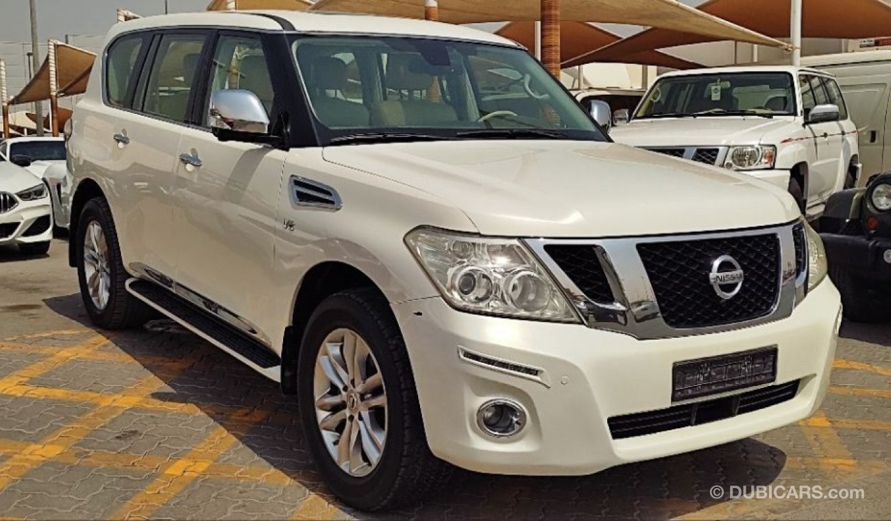 Nissan Patrol 1 فل ابوشن رادار خمس مارات on 1 radar control track electric chairs rear screens five cameras withou