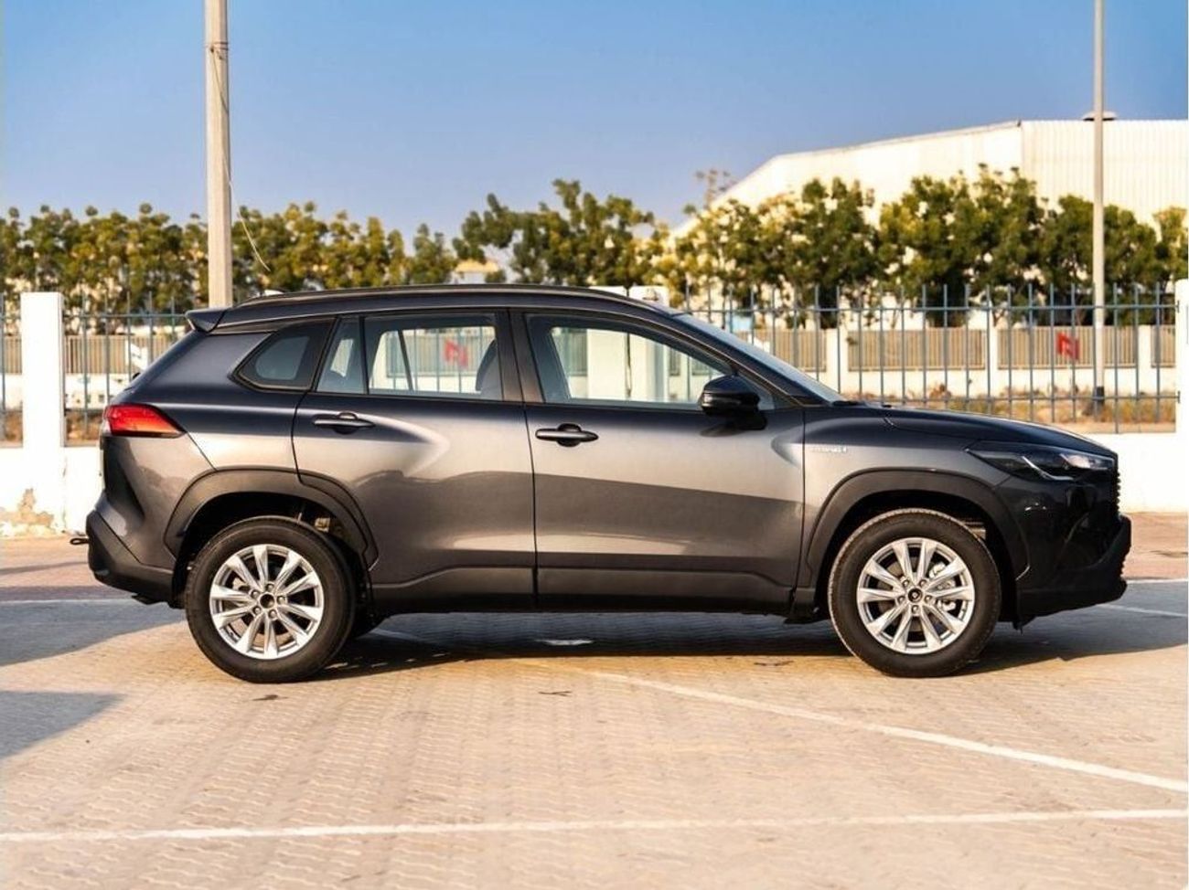 تويوتا كورولا كروس 2024 TOYOTA COROLLA CROSS 1.8 Hybrid MID - GREY METTALIC inside RED | Export Only