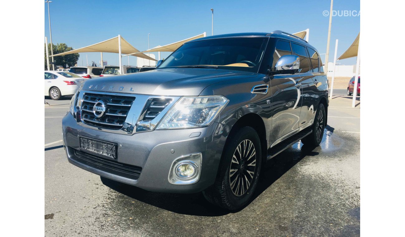 Nissan Patrol بلاتينيوم فل ابشن صبغة وكاله تشييكات وكاله داخل الضمان