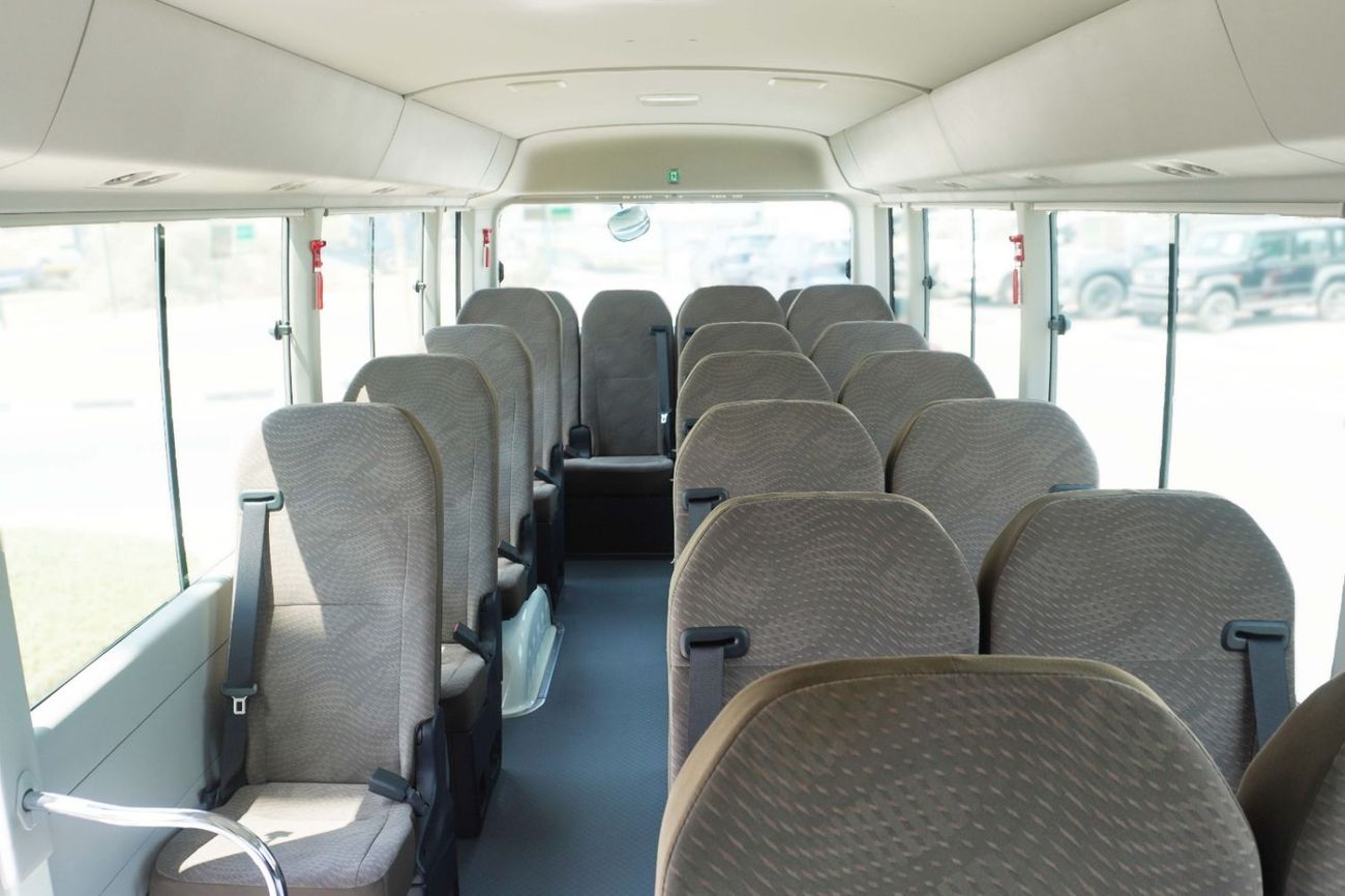 Toyota Coaster ,M/T - 2026