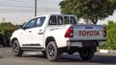 تويوتا هيلوكس SR5 ECTAGR005 – 2026 Toyota Hilux Double Cab 2.7L Petrol Manual 4wd – White w Red