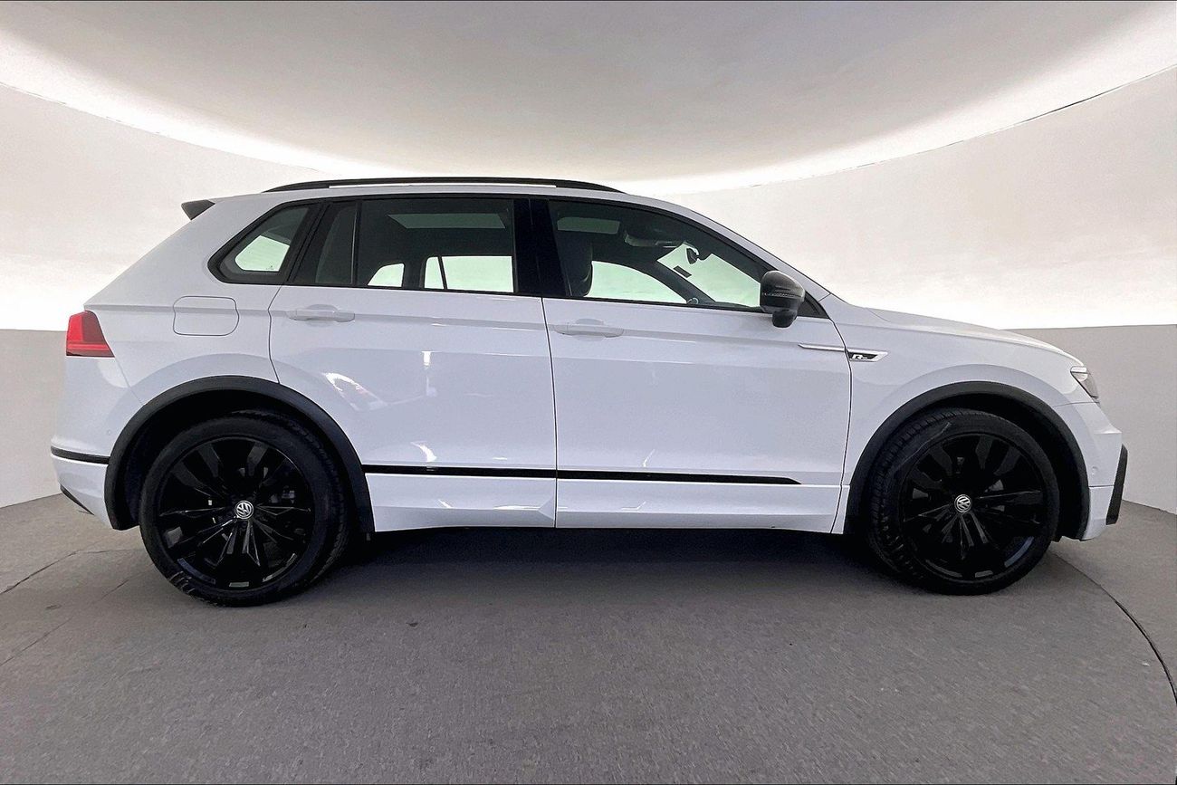 فولكس واجن تيجوان R-Line | شامل الضمان | 0 ﺪﻔﻋﺓ ﺃﻮﻟﻯ