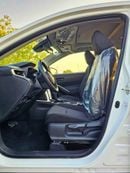 تويوتا كورولا كروس HYBRID ELITE / SUNROOF / FABRIC SEATS / 2.0L V4 PETROL (CODE # CRCHC)