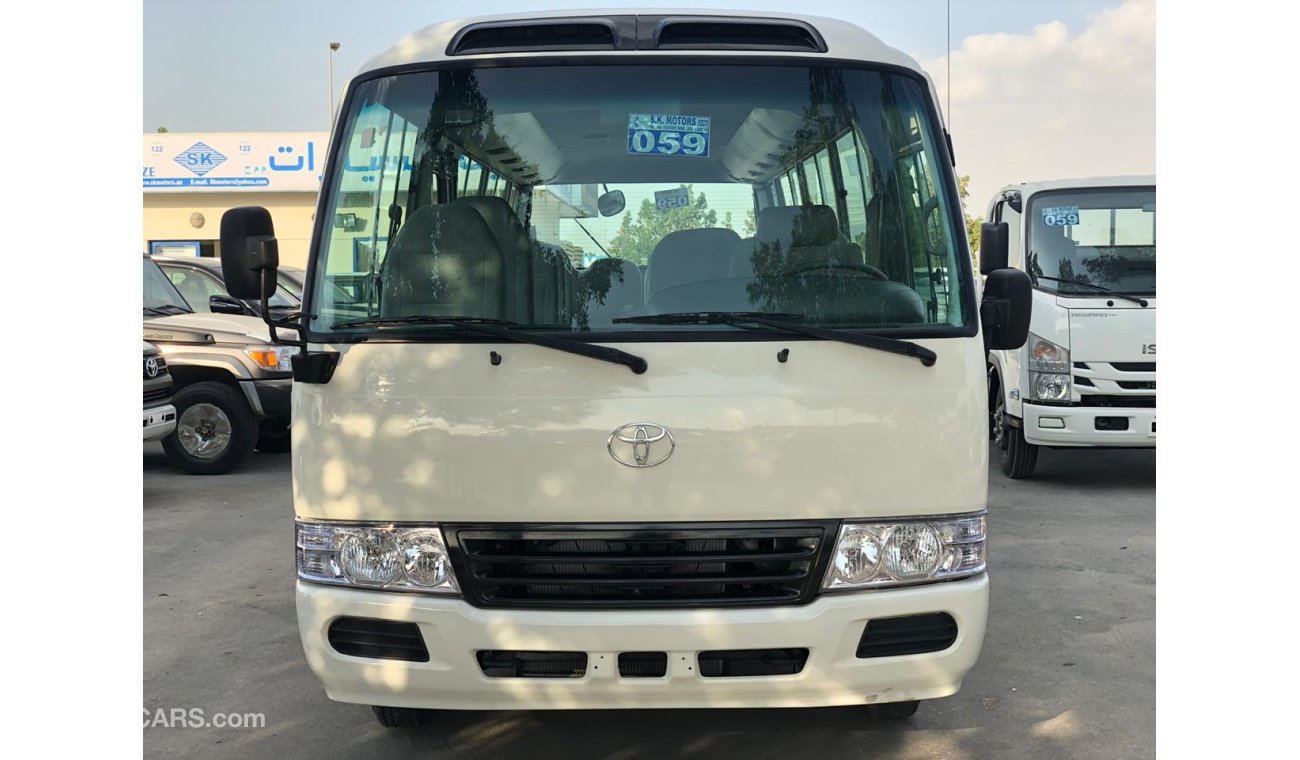 Toyota Coaster 4.2L DIESEL, Interior e Exterior Limpo, Especialmente para Angola, Grande Estoque Disponível.