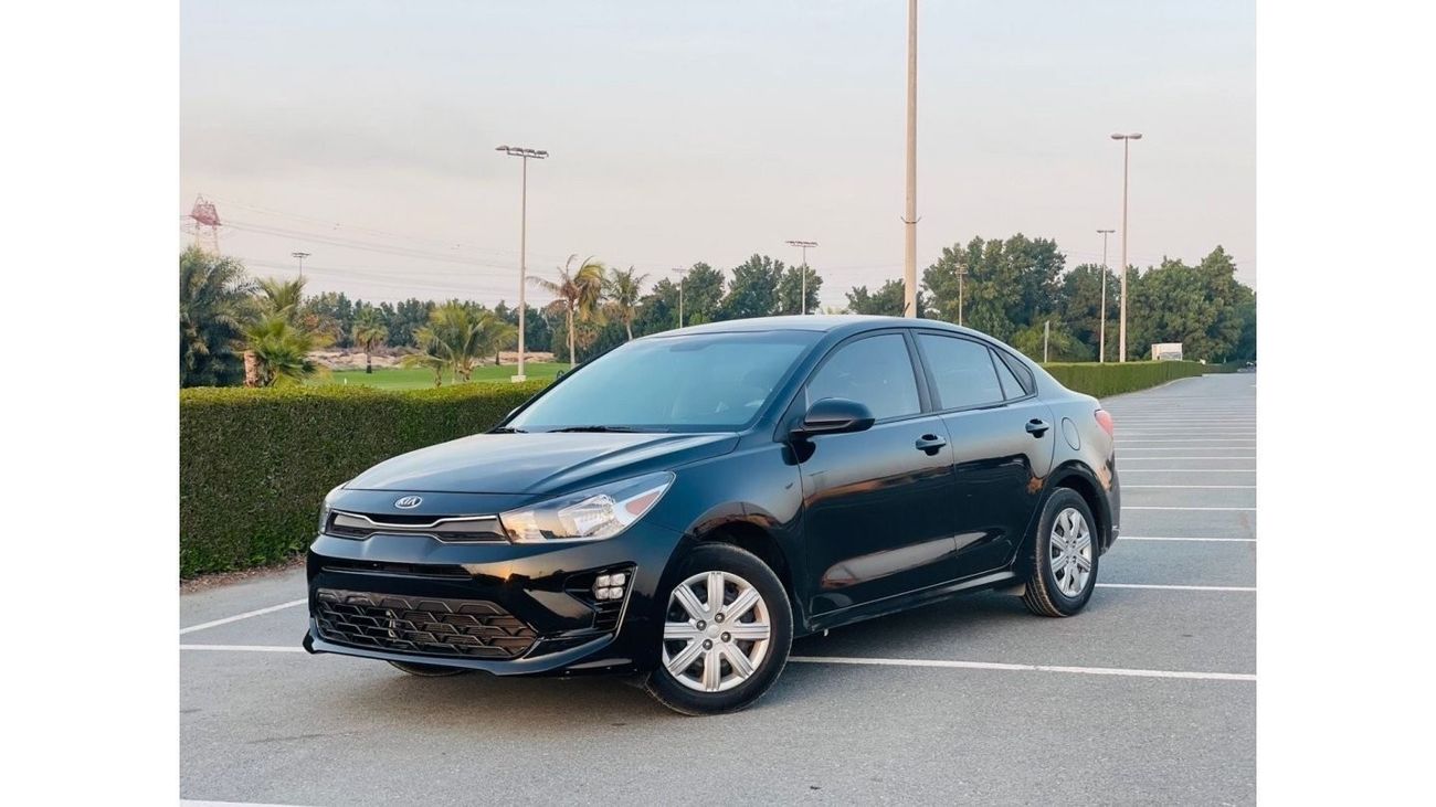 Used Kia Rio EX 1.6 L 2021 for sale in Sharjah - 704169