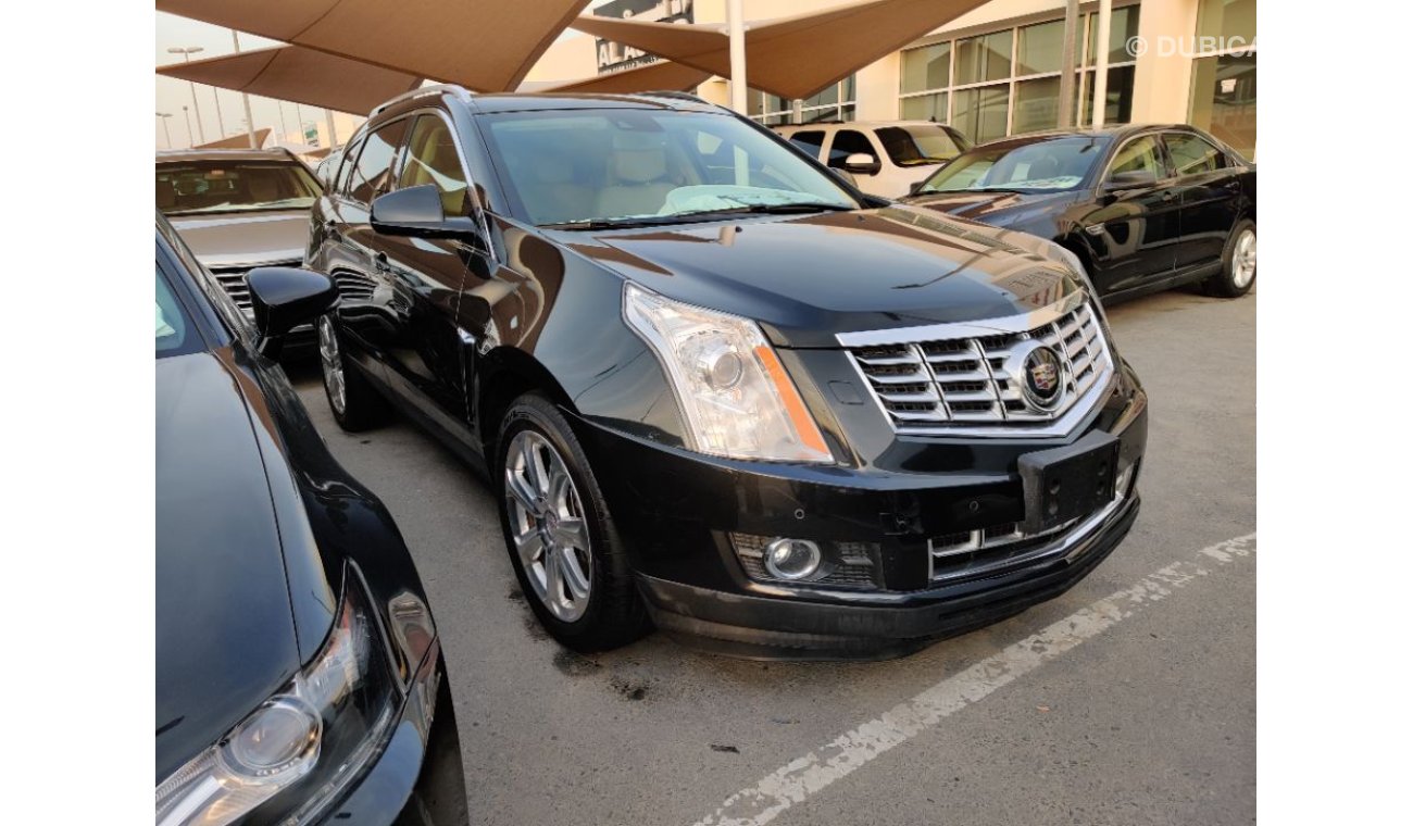 كاديلاك SRX 2014 model GCC specs full options panorama clean car 3.6ltr