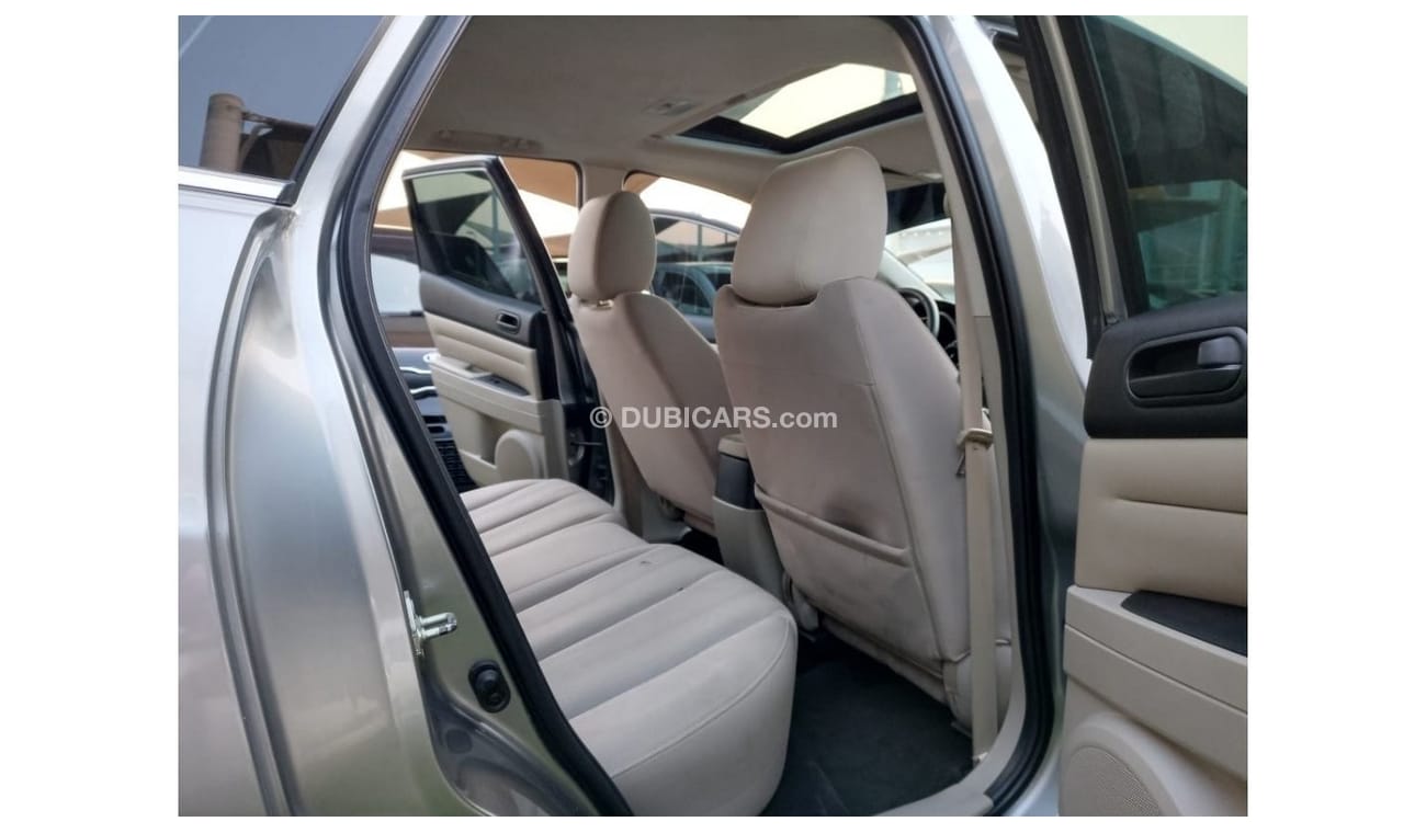 Mazda CX7 Mazda CX7, 2012 model, Gulf, gray color, one number, slot, cruise control, wooden wheels, rear spoil