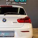 BMW 120i STD AED 765  P.M • 0% Downpayment • BMW 120i Sport-line • 1 Year Warranty